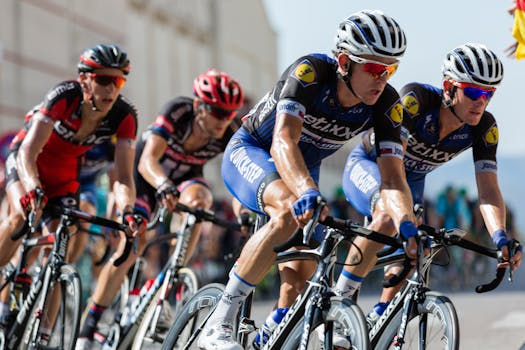 Competitive cyclists in a high-speed race, showcasing athleticism and teamwork. Cycling, Ciclismo.