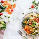 Colorful quinoa salad with fresh vegetables creates a healthy, balanced meal. Food, comida.